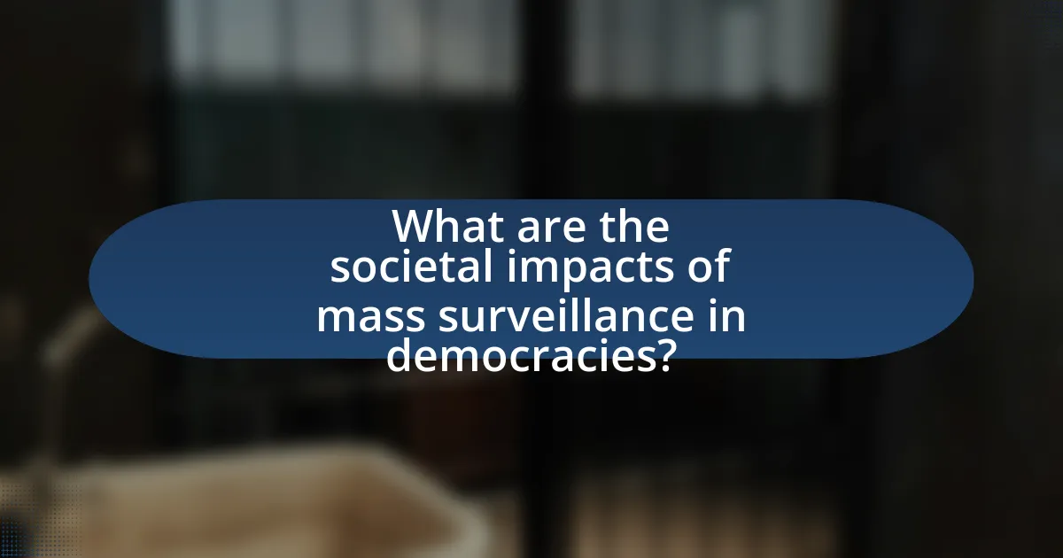 What are the societal impacts of mass surveillance in democracies?